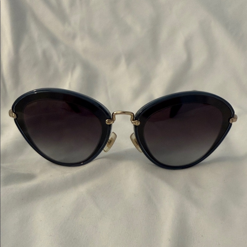 Miu Miu Elegant Black and Gold Women's Sunglasses
